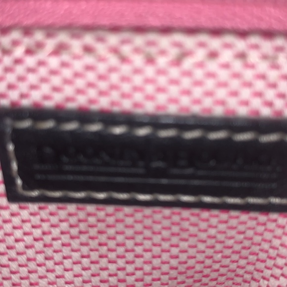 Dooney and Bourke in the classic DB pattern. Navy with pink inside - Picture 7 of 7